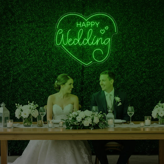 Happy Wedding Heart neon sign by Light Your Way, featuring glowing pink and white LED lights in a romantic heart shape for wedding decor.