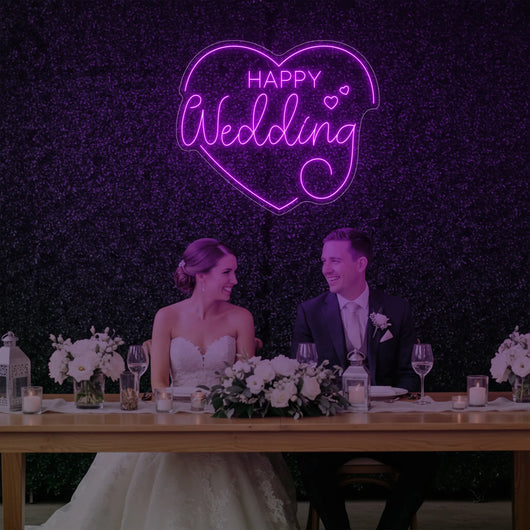 Bright pink "Happy Wedding Heart" neon sign by Light Your Way, ideal for wedding decor and celebrations.