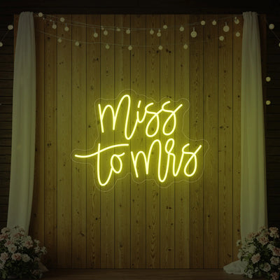 Light Your Way Miss to Mrs Wedding Neon Sign in vibrant pink and white LED lights, ideal for wedding decor.