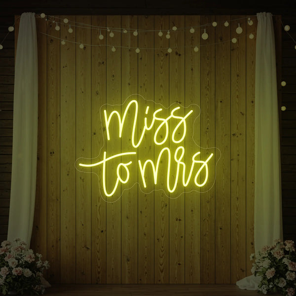 Light Your Way Miss to Mrs Wedding Neon Sign in vibrant pink and white LED lights, ideal for wedding decor.