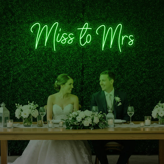 Light Your Way Miss to Mrs Neon Sign V2, wedding neon sign with bright LED lettering on a dark background.