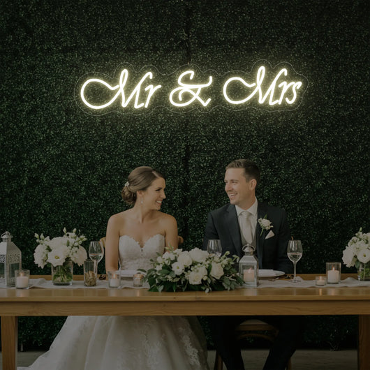 Light Your Way Mr & Mrs V2 wedding neon sign glowing with bright LED lights, perfect for wedding decor and celebrations.