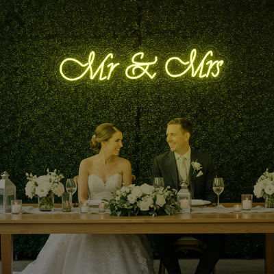 Light Your Way Mr & Mrs V2 wedding neon sign with illuminated LED lettering on a dark background.