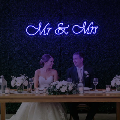 Light Your Way Mr & Mrs V2 wedding neon sign glowing with bright LED lights, perfect for wedding decor or photo backgrounds.