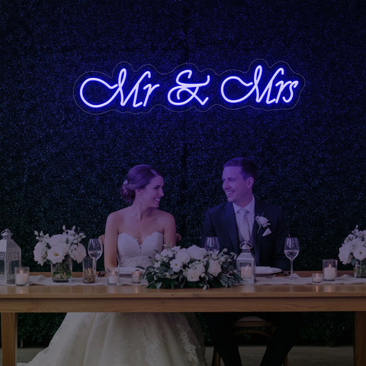 Light Your Way Mr & Mrs V2 wedding neon sign glowing with bright LED lights, perfect for wedding decor or photo backgrounds.