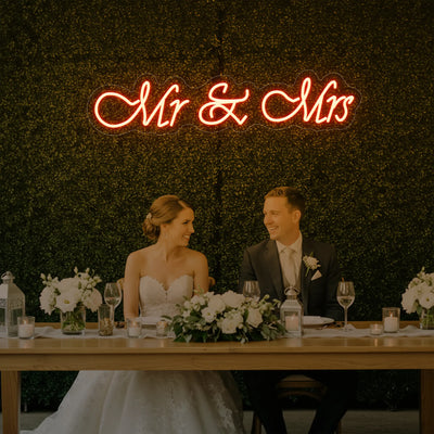 Mr & Mrs V2 wedding neon sign by Light Your Way, featuring illuminated "Mr & Mrs" text on a sleek neon display.