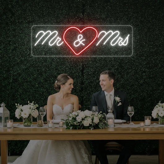 Mr Heart Mrs wedding neon sign by Light Your Way, featuring illuminated "Mr" and "Mrs" letters on a sleek neon display.