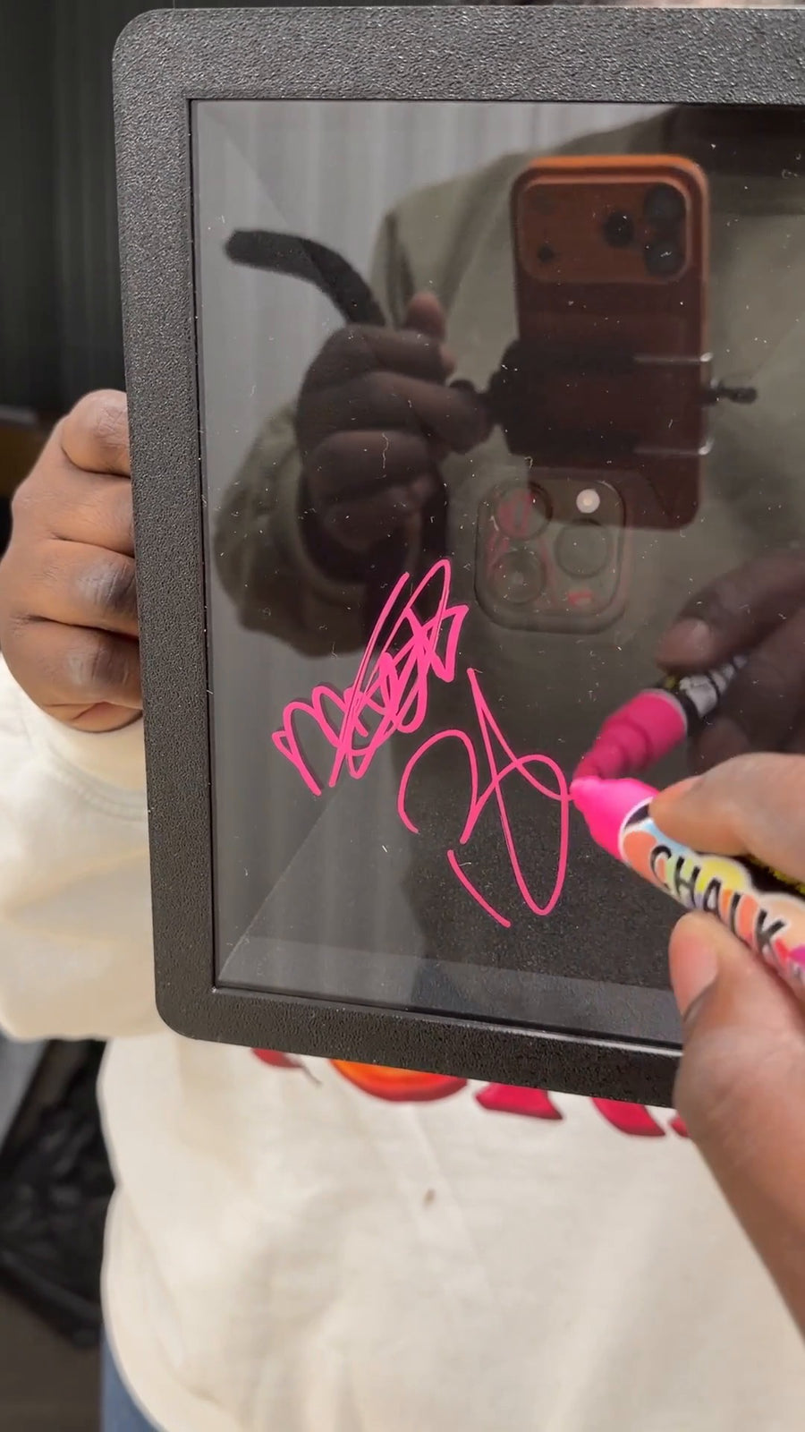 Scribble Roamer roaming video autograph booth by True Backdrops, featuring an acrylic sign and contemporary design.