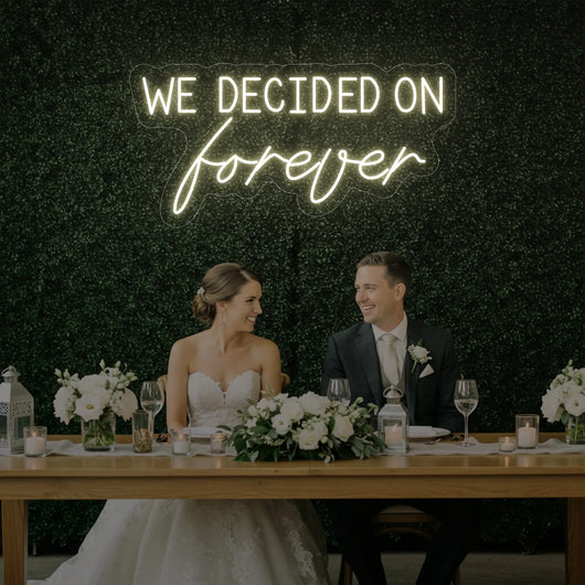 Light Your Way wedding neon sign displaying "We Decided On Forever" in bright LED neon lights for wedding decor.