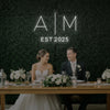 Custom wedding initials neon sign by Light Your Way, illuminated neon sign with personalized initials for wedding decor.