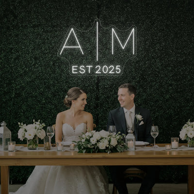 Custom wedding initials neon sign by Light Your Way, illuminated neon sign with personalized initials for wedding decor.