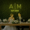 Custom wedding initials neon sign by Light Your Way, featuring elegant glowing initials for wedding decor.