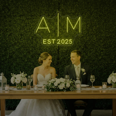 Custom wedding initials neon sign by Light Your Way, featuring elegant glowing initials for wedding decor.