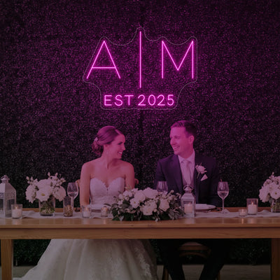 Custom wedding initials neon sign by Light Your Way, featuring personalized glowing initials for wedding decor.