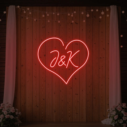 Custom wedding initials neon sign by Light Your Way, featuring personalized illuminated initials for wedding decor.