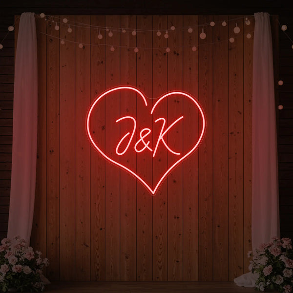 Custom wedding initials neon sign by Light Your Way, featuring personalized illuminated initials for wedding decor.