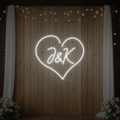 Custom wedding initials neon sign by Light Your Way, featuring elegant illuminated initials for wedding decor.