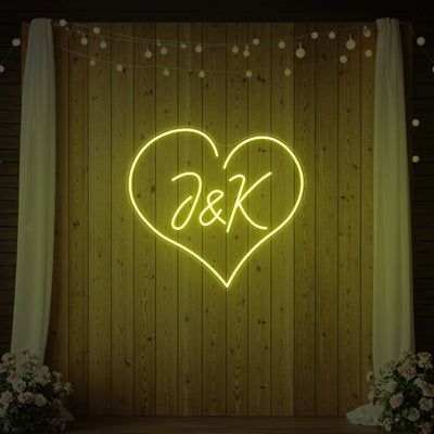 Custom wedding initials neon sign by Light Your Way, featuring elegant glowing initials for wedding decor.