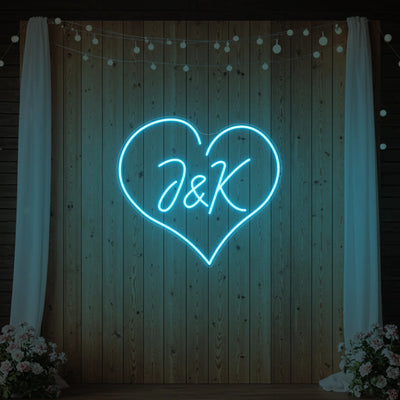 Custom wedding initials neon sign by Light Your Way, featuring personalized illuminated initials for wedding decor.