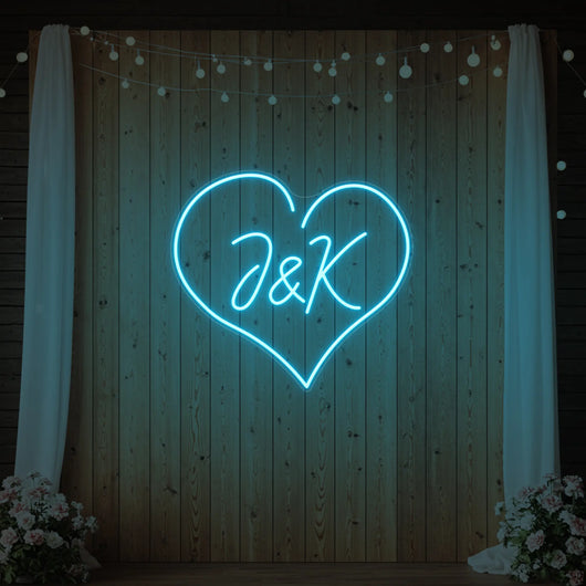 Custom wedding initials neon sign by Light Your Way, featuring personalized illuminated initials for wedding decor.