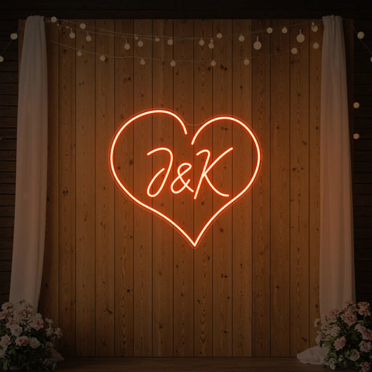 Custom neon sign with wedding initials by Light Your Way, illuminated wedding neon sign for special celebration decor.