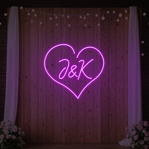 Wedding initials custom neon sign by Light Your Way, vibrant illuminated initials for wedding decor in a modern style.