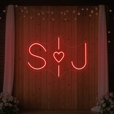 Custom wedding initials neon sign by Light Your Way, featuring personalized illuminated initials for wedding decor.