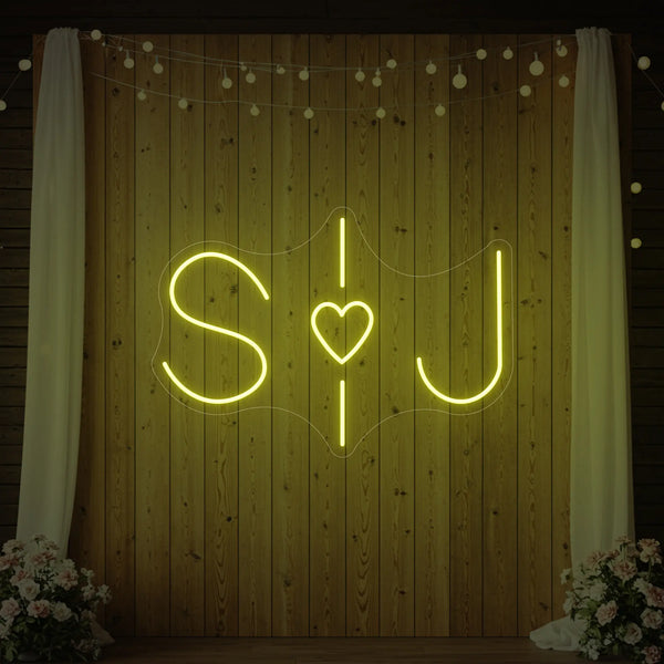 Custom wedding initials neon sign by Light Your Way, glowing with stylish personalized neon lights for wedding decor.