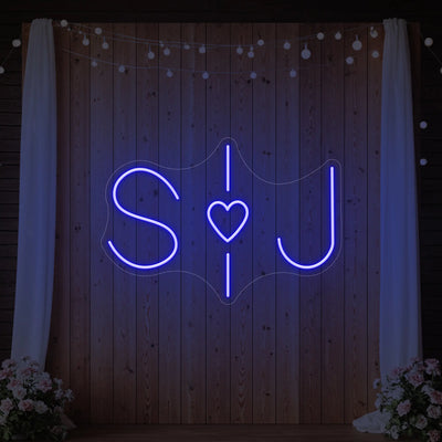 Custom wedding initials neon sign by Light Your Way, glowing personalized wedding neon sign for special celebration decor.