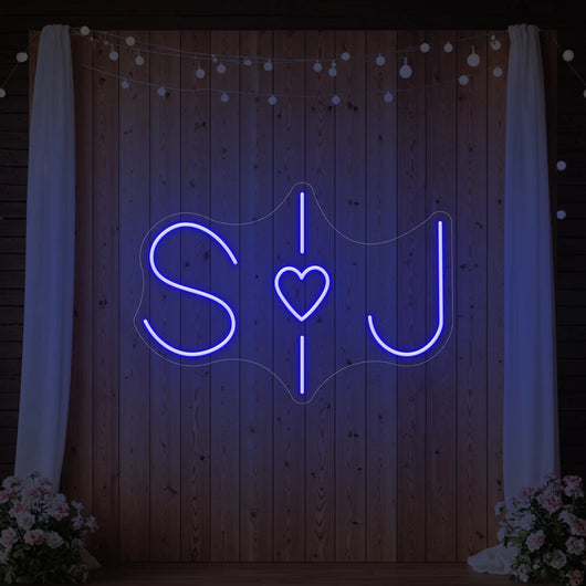 Custom wedding initials neon sign by Light Your Way, glowing personalized wedding neon sign for special celebration decor.