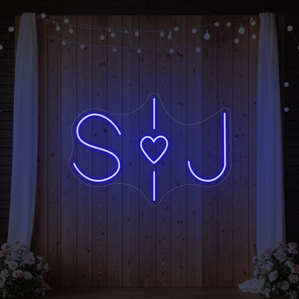 Custom wedding initials neon sign by Light Your Way, glowing personalized wedding neon sign for special celebration decor.