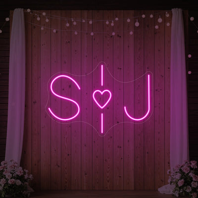 Wedding initials custom neon sign by Light Your Way, glowing white with elegant script for wedding decor.